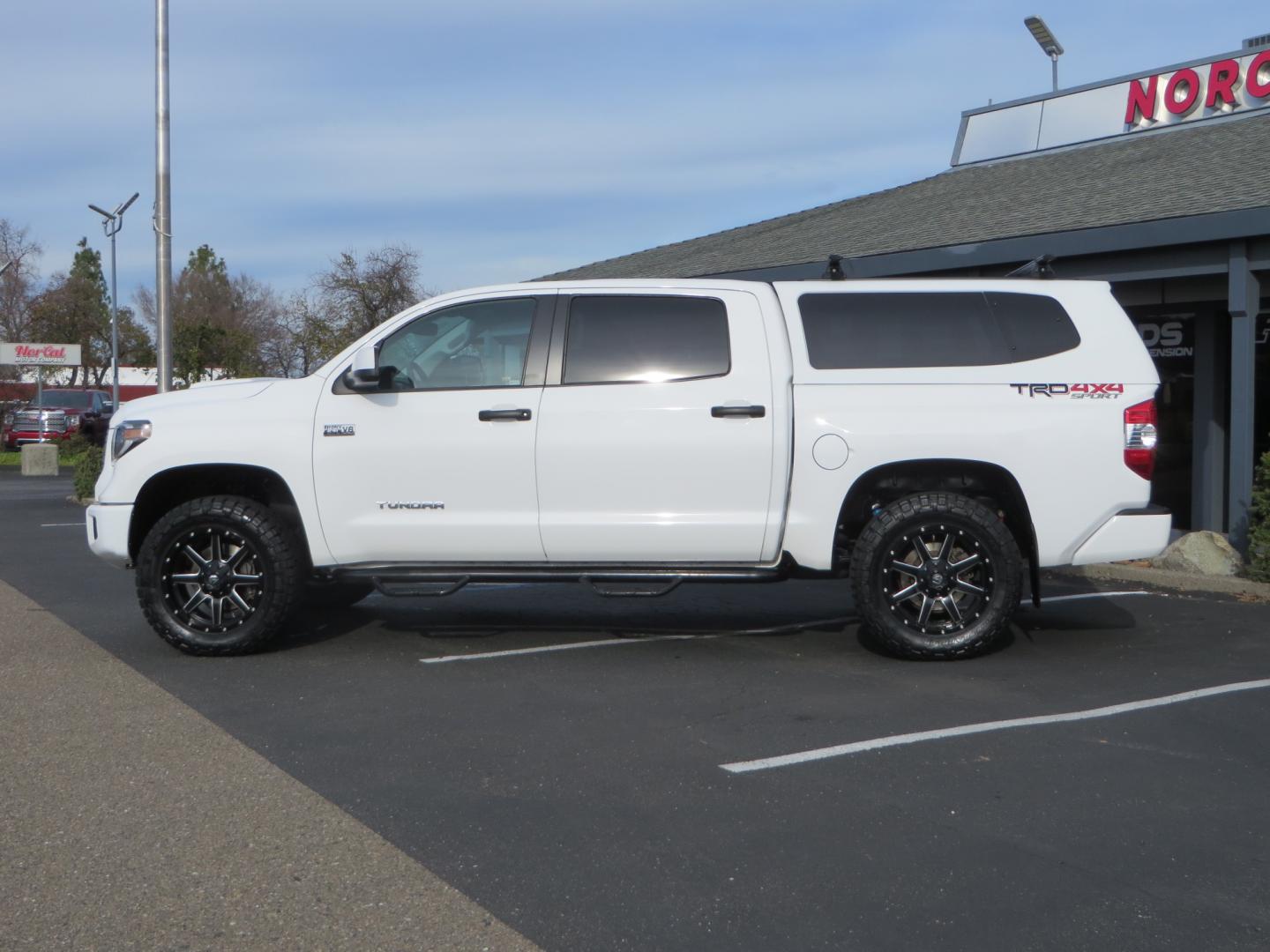 2019 White /BLACK Toyota Tundra SR5 5.7L V8 CrewMax 4WD (5TFDY5F19KX) with an 5.7L V8 DOHC 32V engine, 6A transmission, located at 2630 Grass Valley Highway, Auburn, CA, 95603, (530) 508-5100, 38.937893, -121.095482 - Clean leveled Tundra with 20" Fuel Maverick wheels, Nitto Ridge Grappler tires, N-Fab running boards, Snug Top camper shell with Yakima racks. - Photo#7